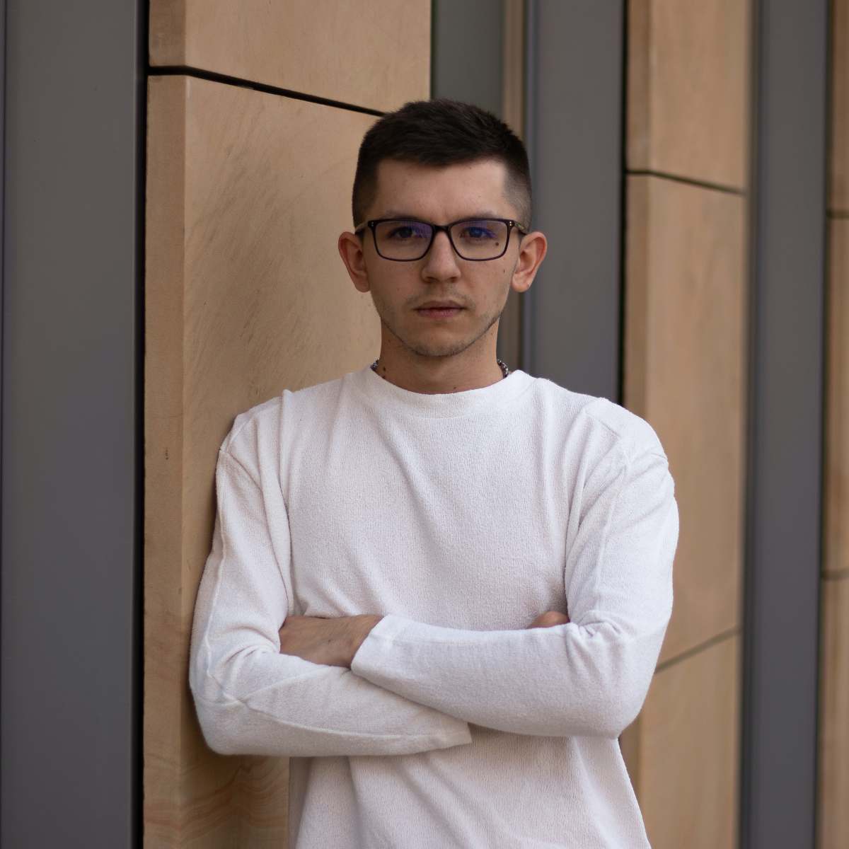 portrait man woman in white sweater wearing black framed eyeglasses portrait man with glasses
